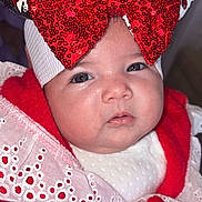 Simëa participe au concours pour gagner de l'argent avec cette photo : accessory, adorable, baby, bow, child, closeup, costume, cute, expression, eyes, face, fashion, headband, holiday, indoors, infant, person, portrait, red_clothing, soft_lighting