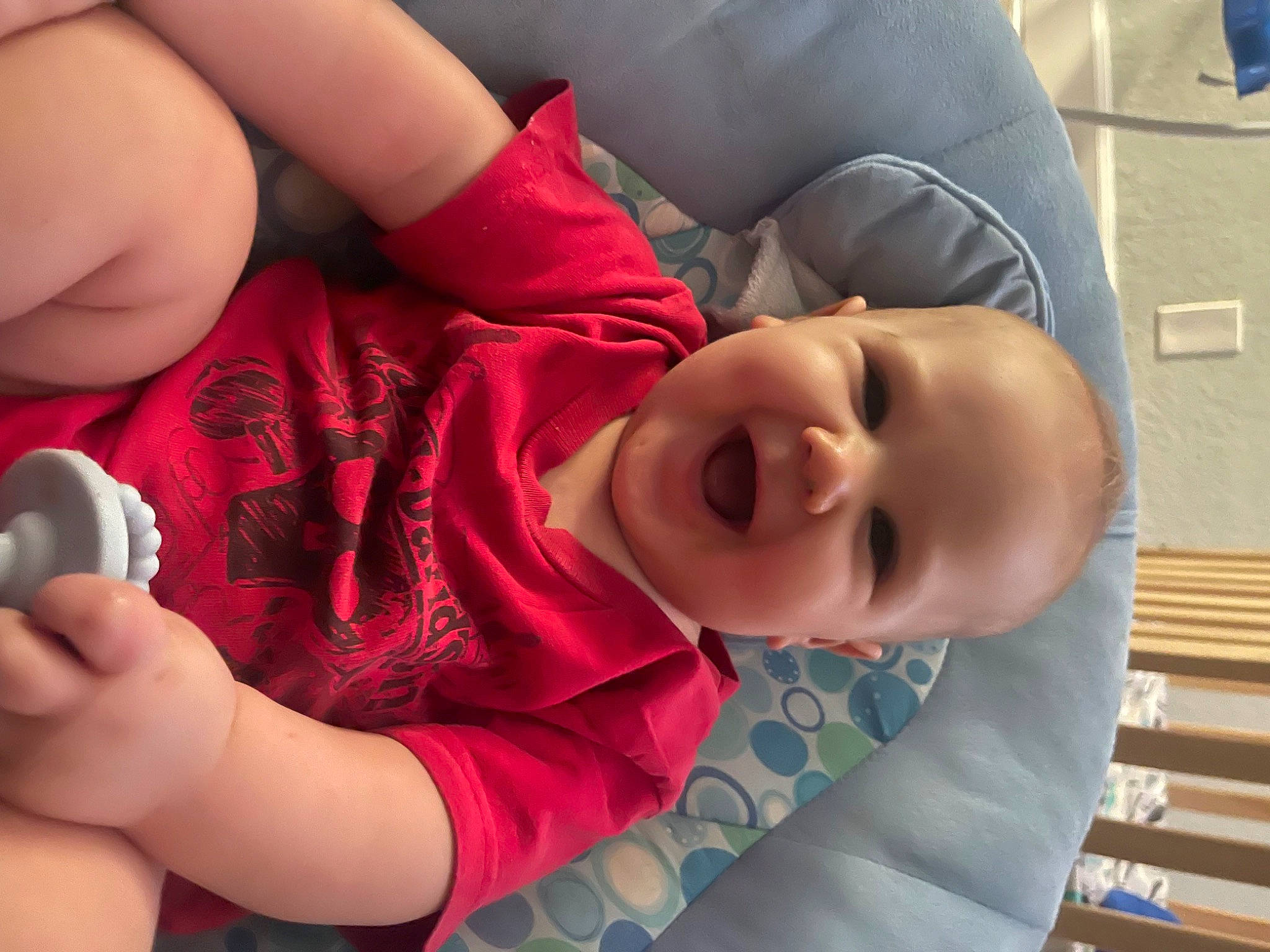 Gunner is registered to the contest to win money with this photo: baby, baby_toddler_clothing, cheek, child, comfort, elbow, eyelash, finger, gesture, happy, joint, mouth, nail, nose, organ, person, skin, smile, thumb, toddler