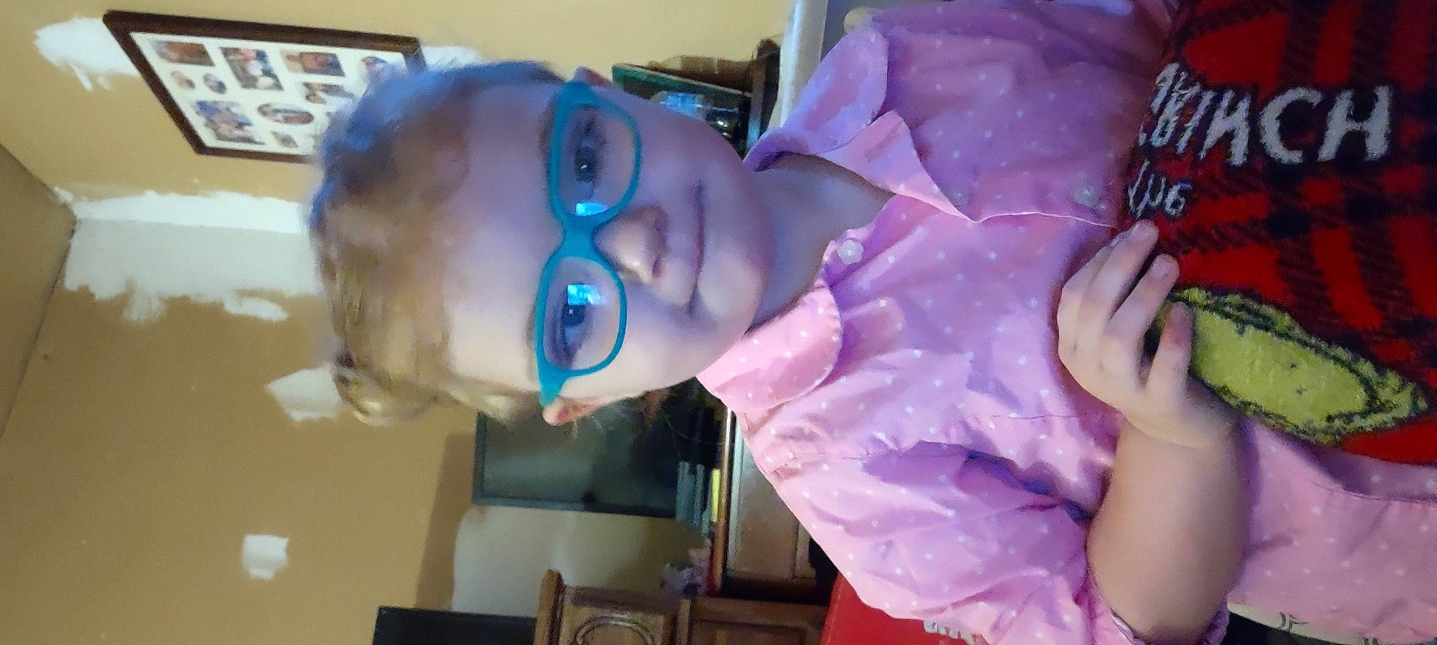 Karen is registered to the contest to win money with this photo: chest, child, ear, eyelash, eyewear, finger, flesh, fun, glasses, hair_coloring, hand, jaw, magenta, mouth, nose, person, personal_protective_equipment, purple, room, service