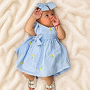 Antonella joined the competition — help win amazing prizes! baby, infant, child, portrait, lying_down, blanket, blue_dress, striped_clothing, bow, headband, sandals, fashion, indoors, soft_blanket, smiling, face, hands, feet, baby_photography, cute