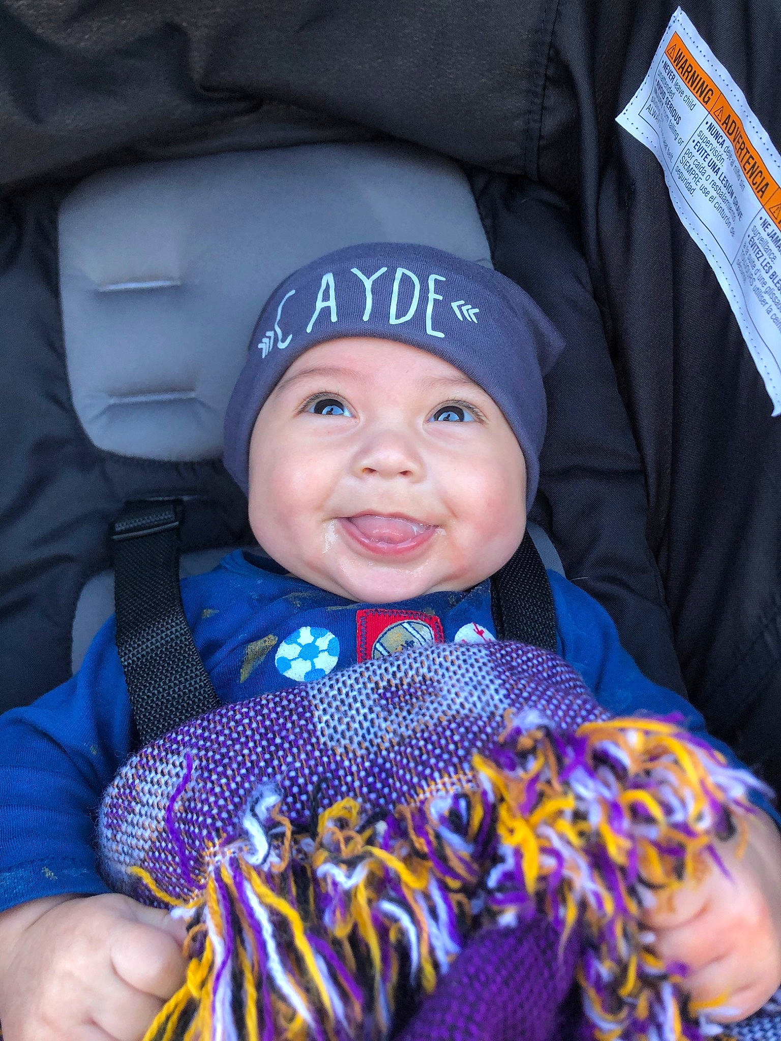 Cayde joined the competition — help win amazing prizes! baby, bonnet, cap, child, fun, headgear, headwear, joy, knit_cap, knitting, person, product, purple, smile, toddler