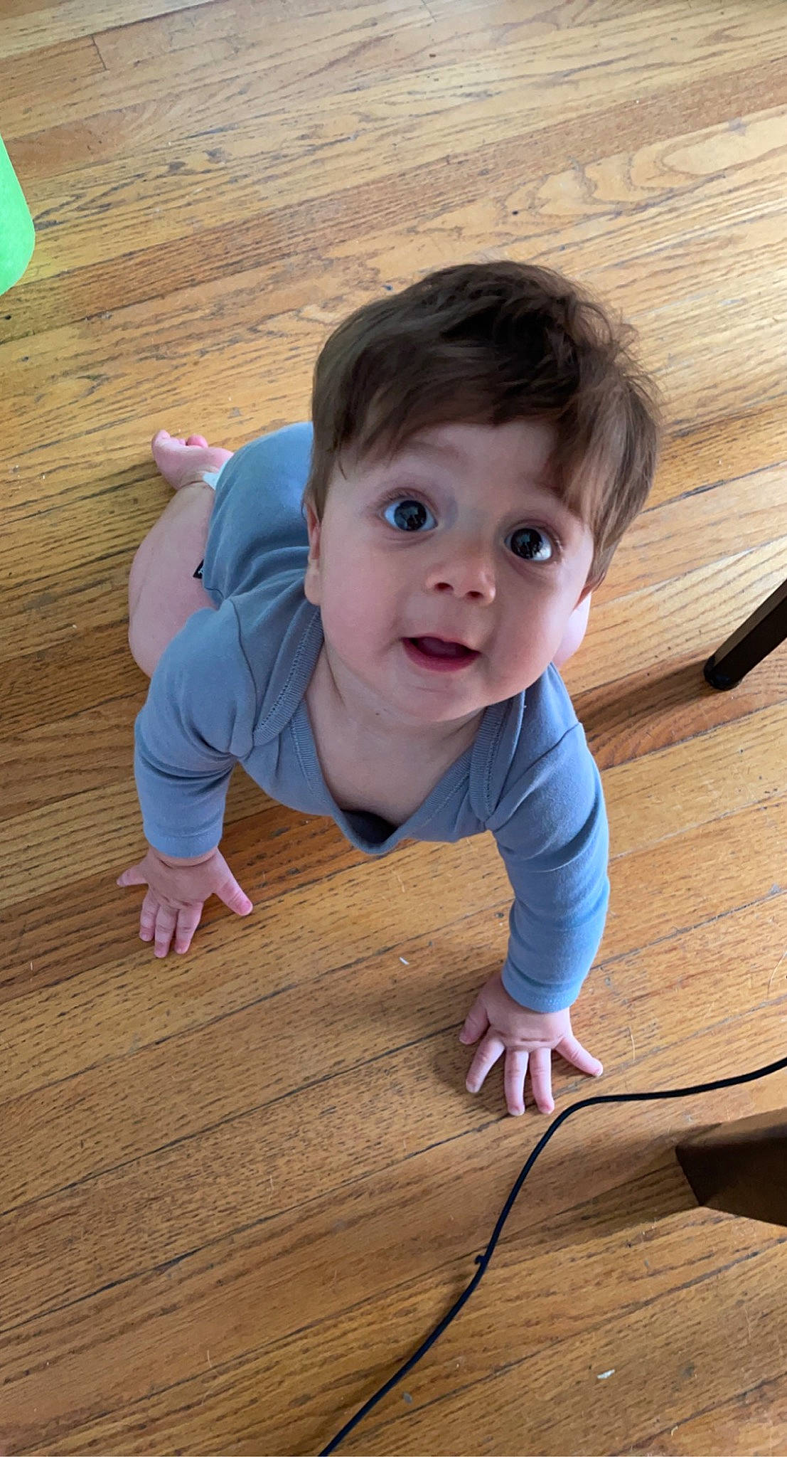 Gabriel joined the competition — help win amazing prizes! baby, baby_toddler_clothing, cheek, chin, eye, face, finger, flash_photography, floor, flooring, happy, hardwood, head, iris, nose, person, skin, smile, surprise, toddler