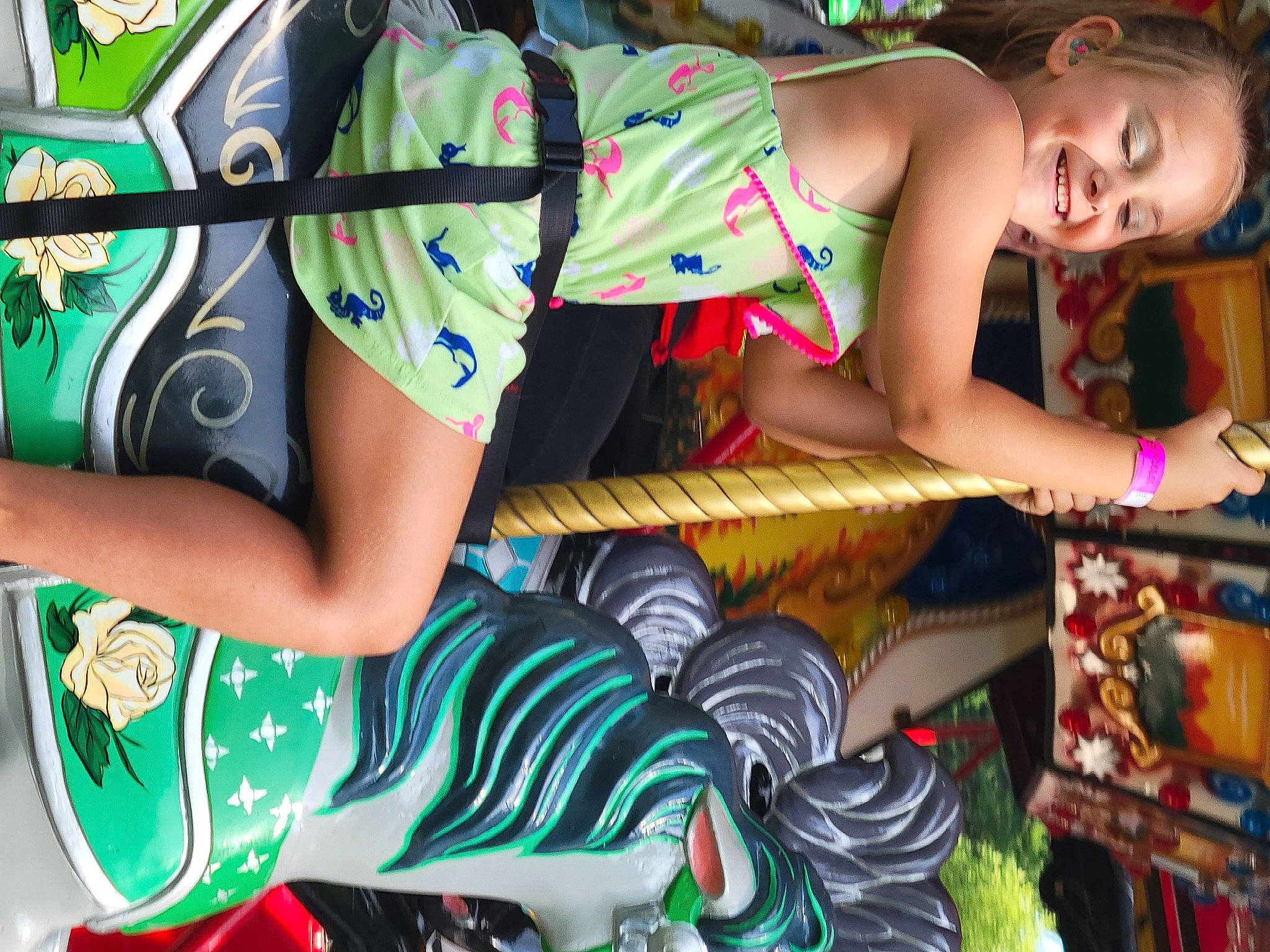 Shauna is registered to the contest to win money with this photo: arm, child, dress, event, fashion_accessory, fashion_design, fun, green, happy, hat, human_leg, joy, leg, leisure, magenta, pattern, person, smile, street_fashion, t_shirt