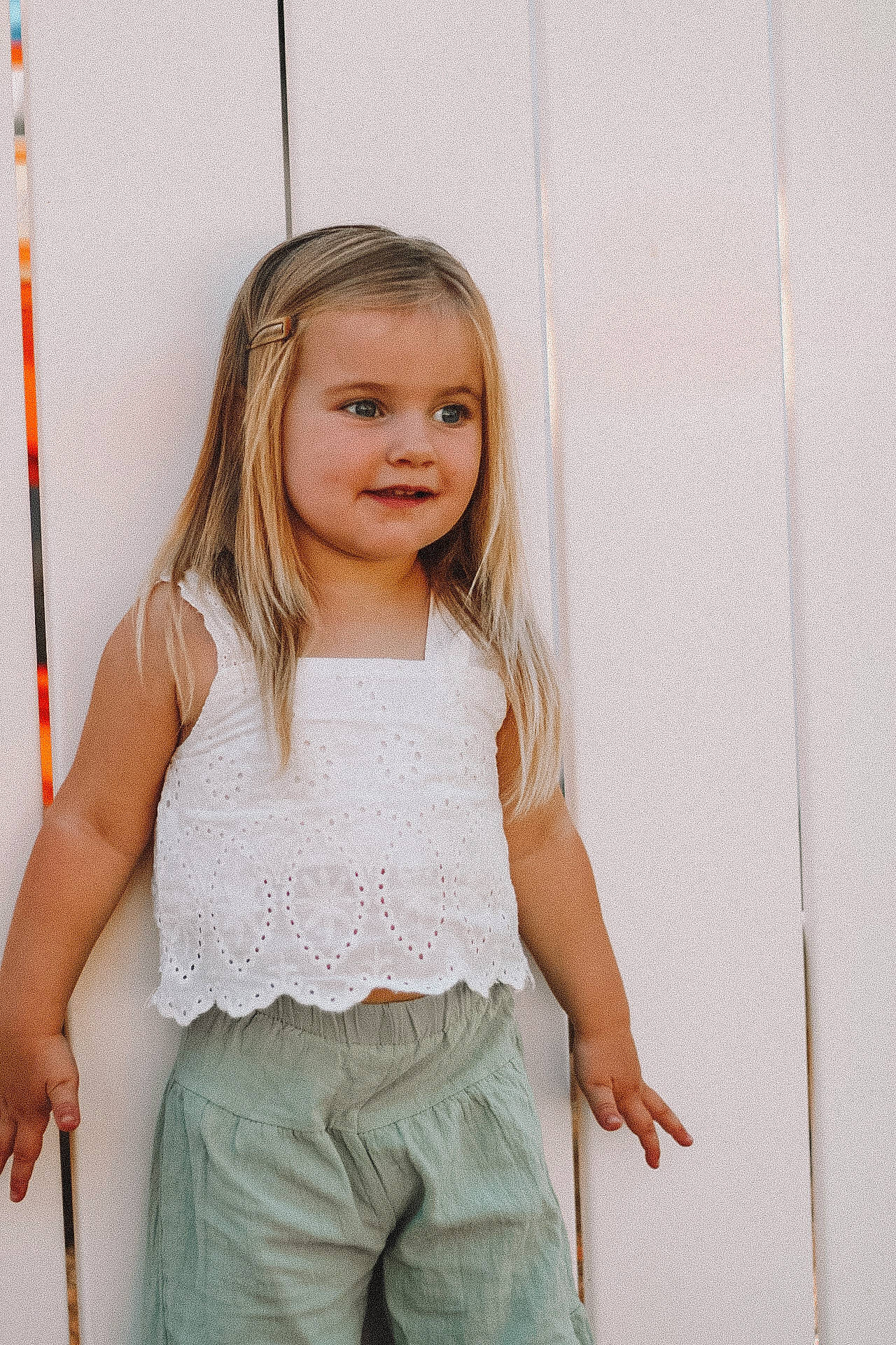 Kensley is registered to the contest to win money with this photo: arm, baby_toddler_clothing, dress_shirt, face, fashion, fashion_design, gesture, hair, happy, head, joint, joy, neck, outerwear, person, shoulder, skin, sleeve, smile, standing