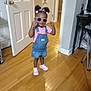 Kalani joined the competition — help win amazing prizes! bows, casual_clothing, child, cute, denim_overalls, door, hair_buns, hallway, home, indoor, person, pink_shirt, pink_shoes, pink_sunglasses, playful, smiling, standing, toddler, wooden_floor, young_child