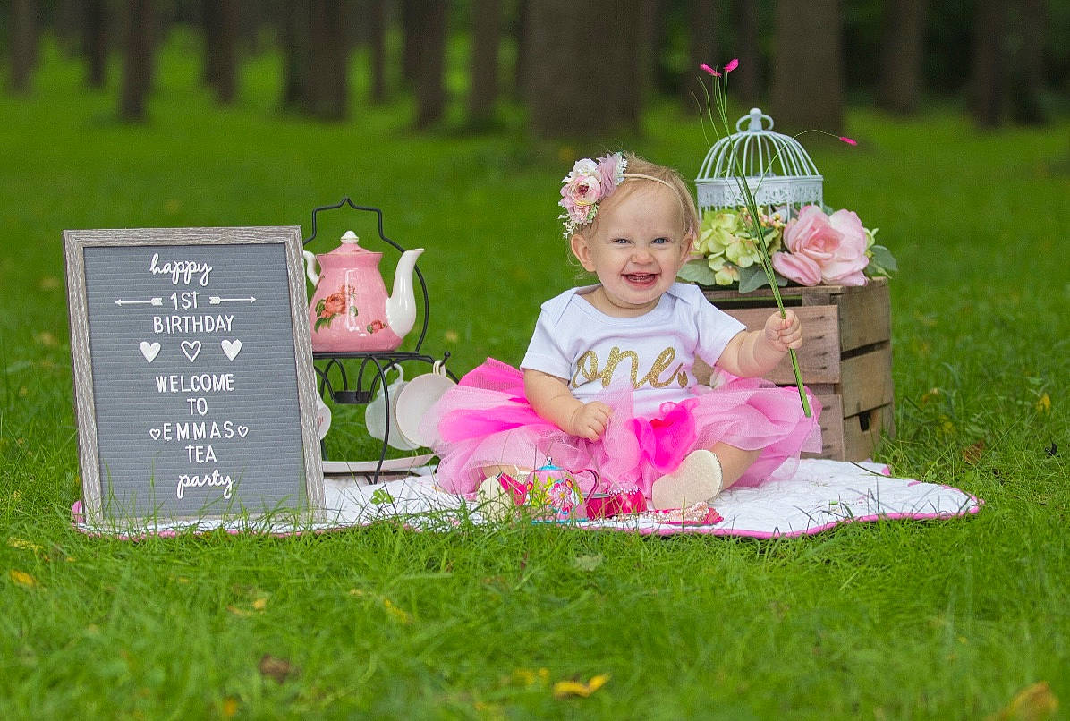 Emmy joined the competition — help win amazing prizes! child, flower, flower_arranging, garden, grass, infant, joy, lawn, person, petal, picnic, pink, plant, recreation, spring, toddler