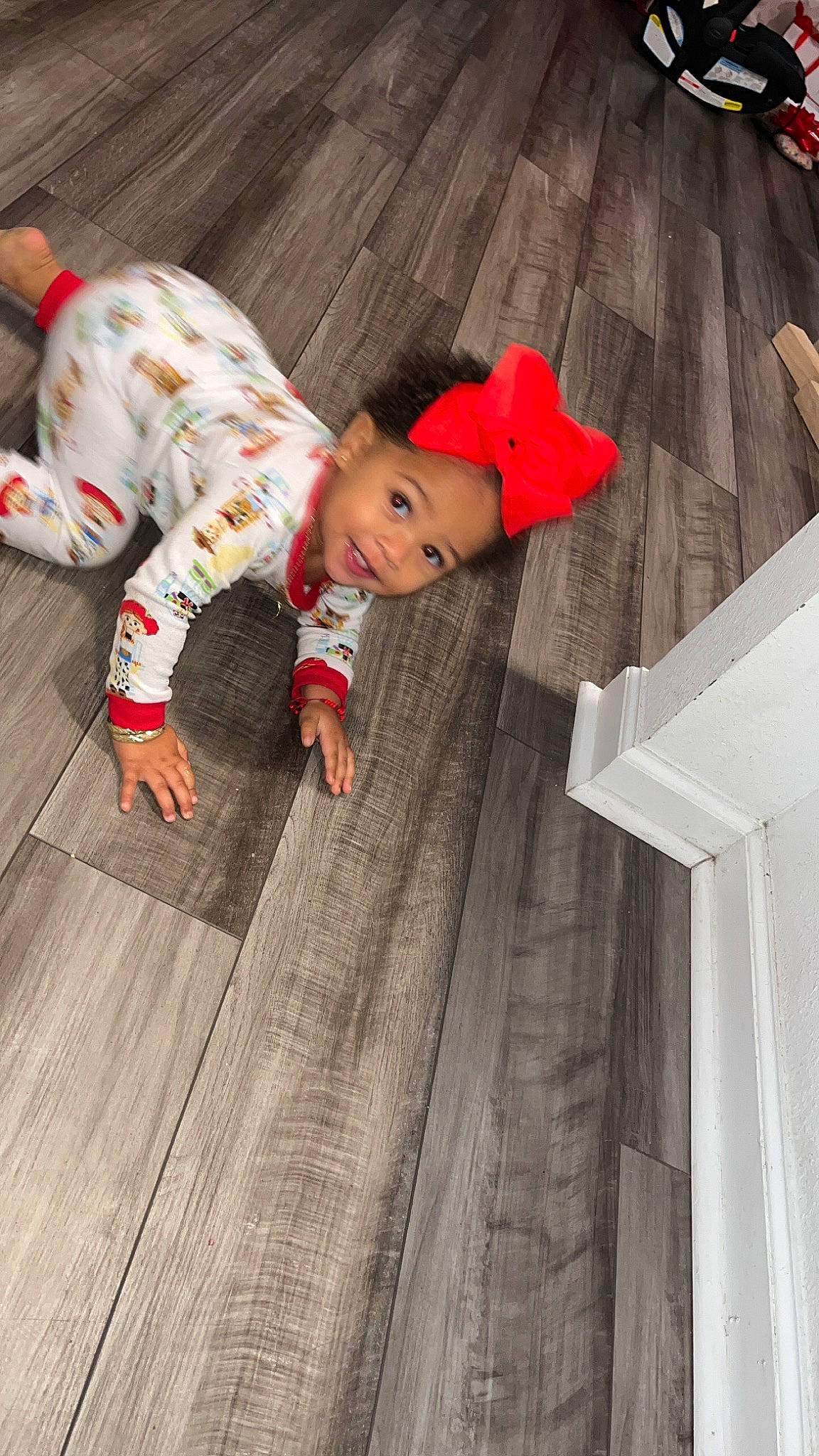 Cataleya is registered to the contest to win money with this photo: baby, baby_toddler_clothing, carmine, child, concrete, floor, flooring, fun, happy, hardwood, headwear, laminate_flooring, pattern, person, sitting, sleeve, smile, toddler, wood, wood_flooring
