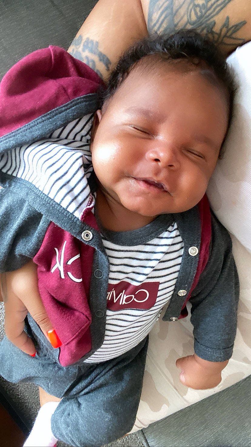 Kingsley joined the competition — help win amazing prizes! baby, baby_toddler_clothing, cheek, chin, comfort, cool, eyebrow, facial_expression, finger, happy, lip, mouth, neck, nose, outerwear, person, skin, sleeve, smile, textile