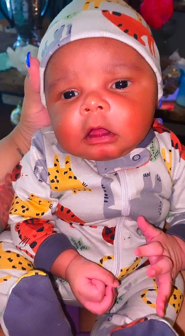 Kingsley is registered to the contest to win money with this photo: baby, baby_products, baby_toddler_clothing, cheek, child, event, fashion_accessory, finger, fun, happy, headwear, iris, lip, mouth, nose, orange, person, pink, skin, sleeve