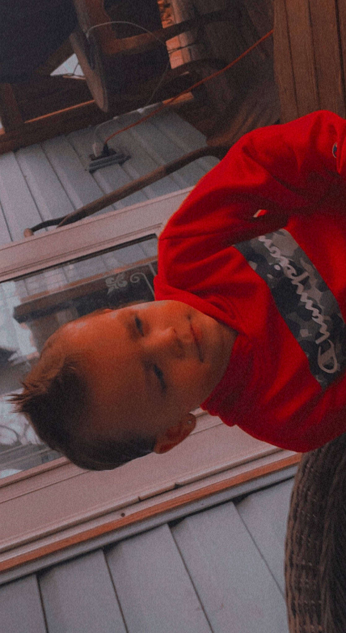 Isaiah is registered to the contest to win money with this photo: carmine, elbow, event, flesh, flooring, fun, hardwood, person, room, sleeve, wood