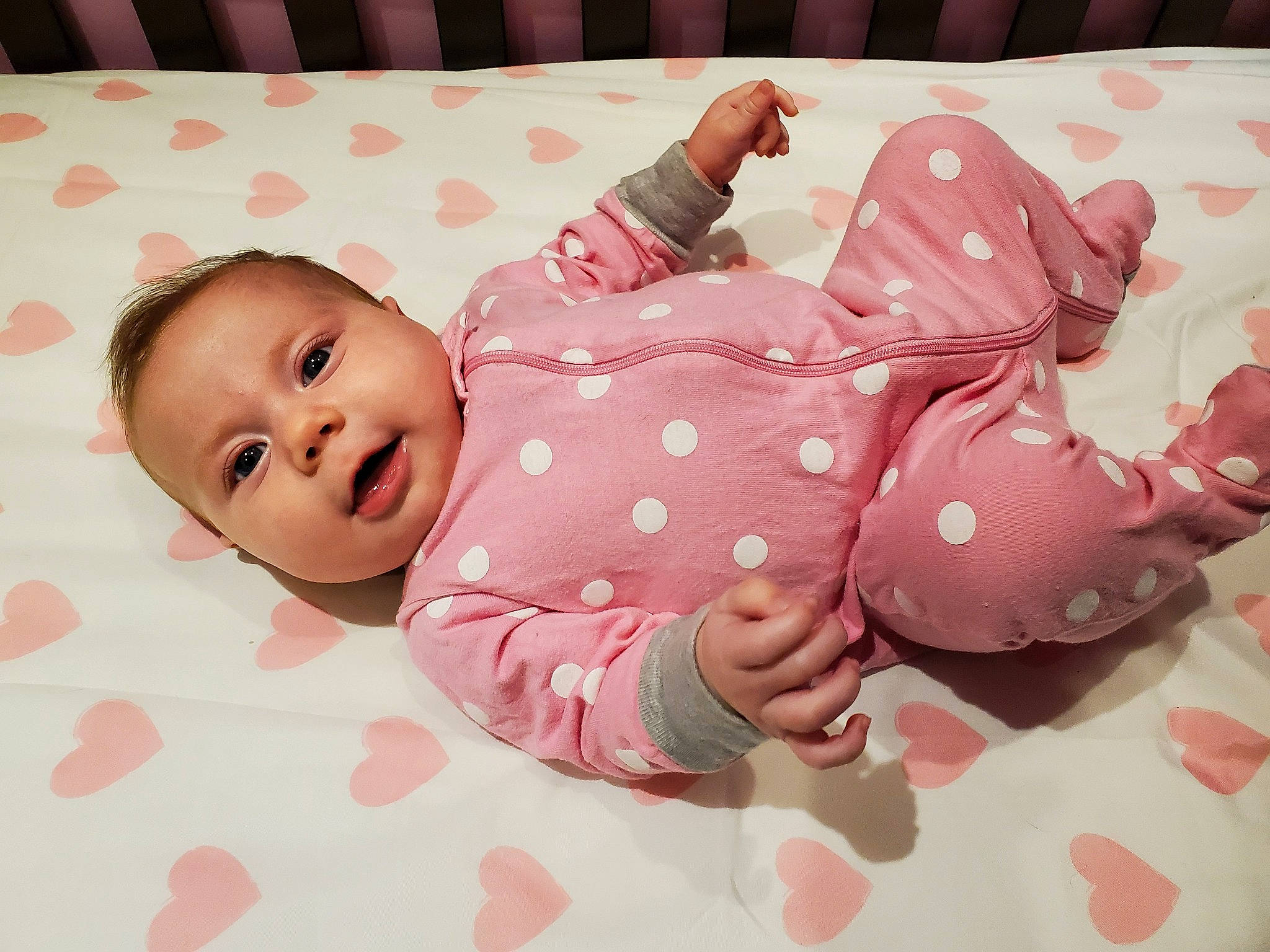 Leslie joined the competition — help win amazing prizes! baby, baby_products, baby_sleeping, baby_toddler_clothing, bedding, carmine, cheek, child, comfort, facial_expression, foot, happy, linens, magenta, pattern, person, pink, room, skin, sleeve