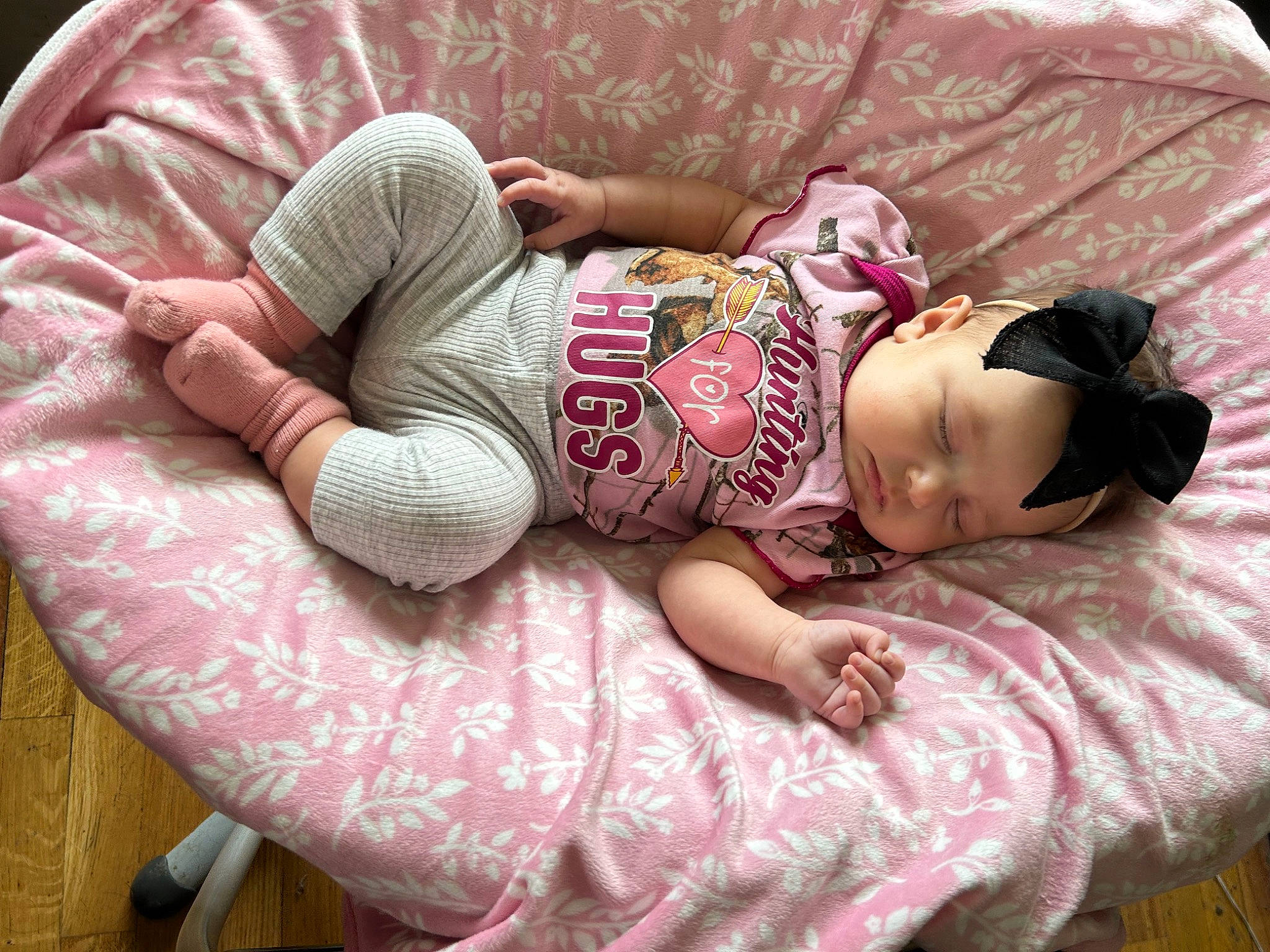 Kinsley joined the competition — help win amazing prizes! baby, baby_products, baby_sleeping, baby_toddler_clothing, bed, bedding, bedtime, child, comfort, couch, headgear, headwear, linens, nap, person, pink, room, sitting, sleep, sleeve