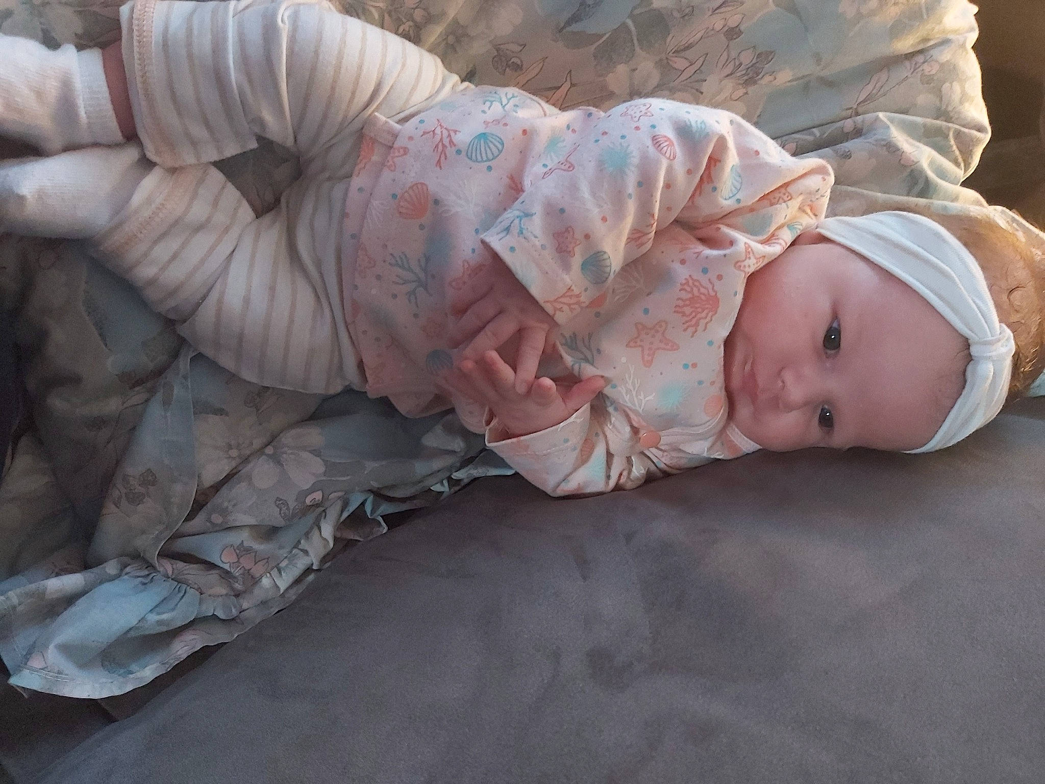 Malia participe au concours pour gagner de l'argent avec cette photo : baby, baby_toddler_clothing, camouflage, child, comfort, grass, hat, headwear, human_body, linens, military_camouflage, nap, pattern, person, portrait_photography, sitting, sleep, sleeve, toddler, tree