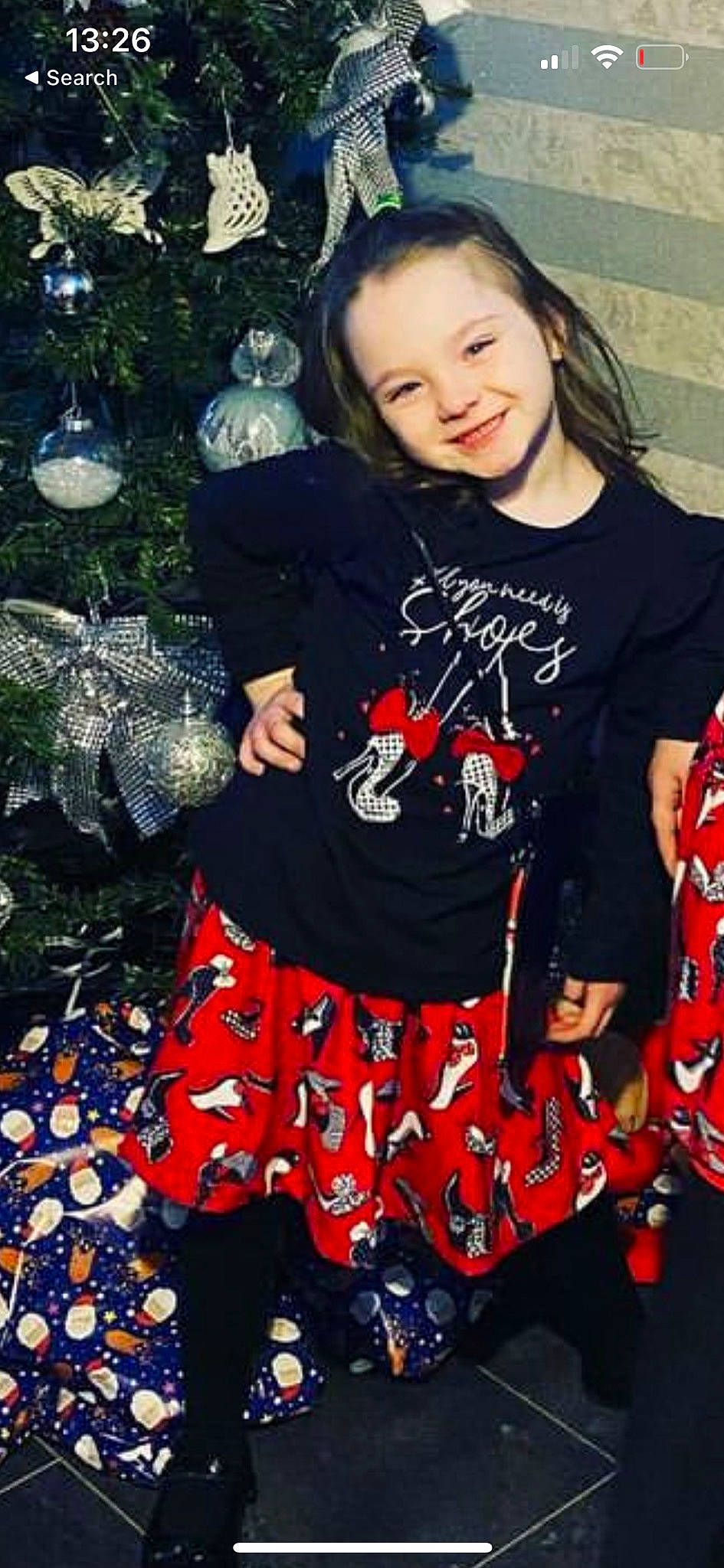 Lucia joined the competition — help win amazing prizes! baby_toddler_clothing, child, christmas_tree, cool, event, fashion_accessory, hair, happy, holiday, holiday_ornament, joy, ornament, pattern, person, shorts, sitting, sleeve, smile, t_shirt, thigh