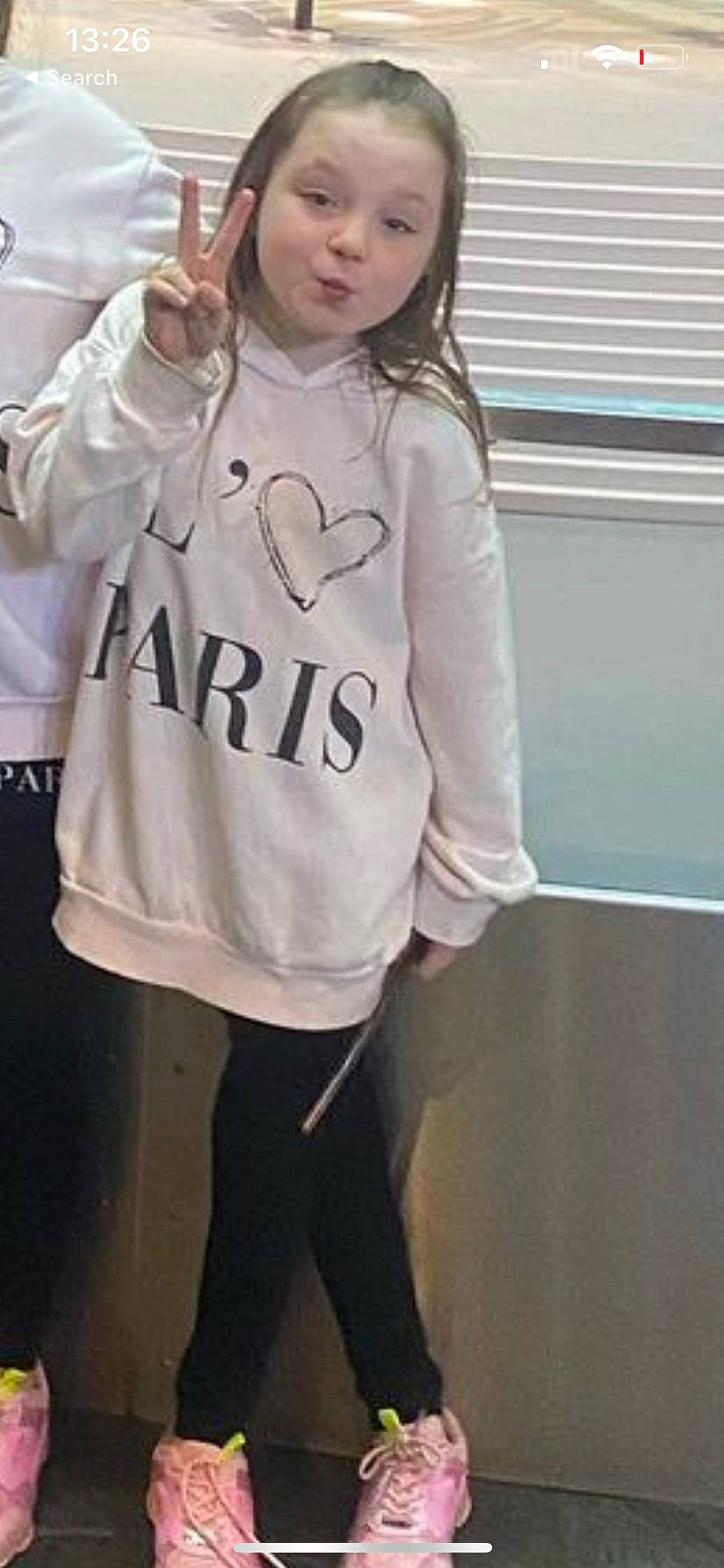 Lucia is registered to the contest to win money with this photo: denim, eyewear, facial_expression, fashion_accessory, font, gesture, hair, hairstyle, happy, hood, jersey, long_sleeved_t_shirt, neck, outerwear, person, personal_protective_equipment, shoulder, sleeve, sportswear, t_shirt