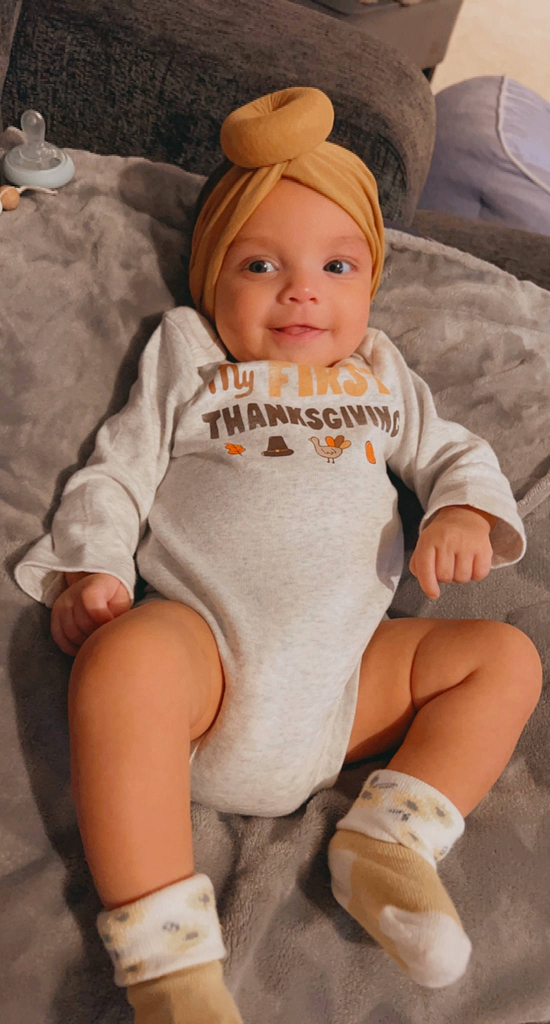 Jersey is registered to the contest to win money with this photo: baby, baby_toddler_clothing, cheek, chin, clothing, comfort, eye, face, head, headgear, human_body, iris, joy, leg, organ, outerwear, person, pink, skin, sleeve