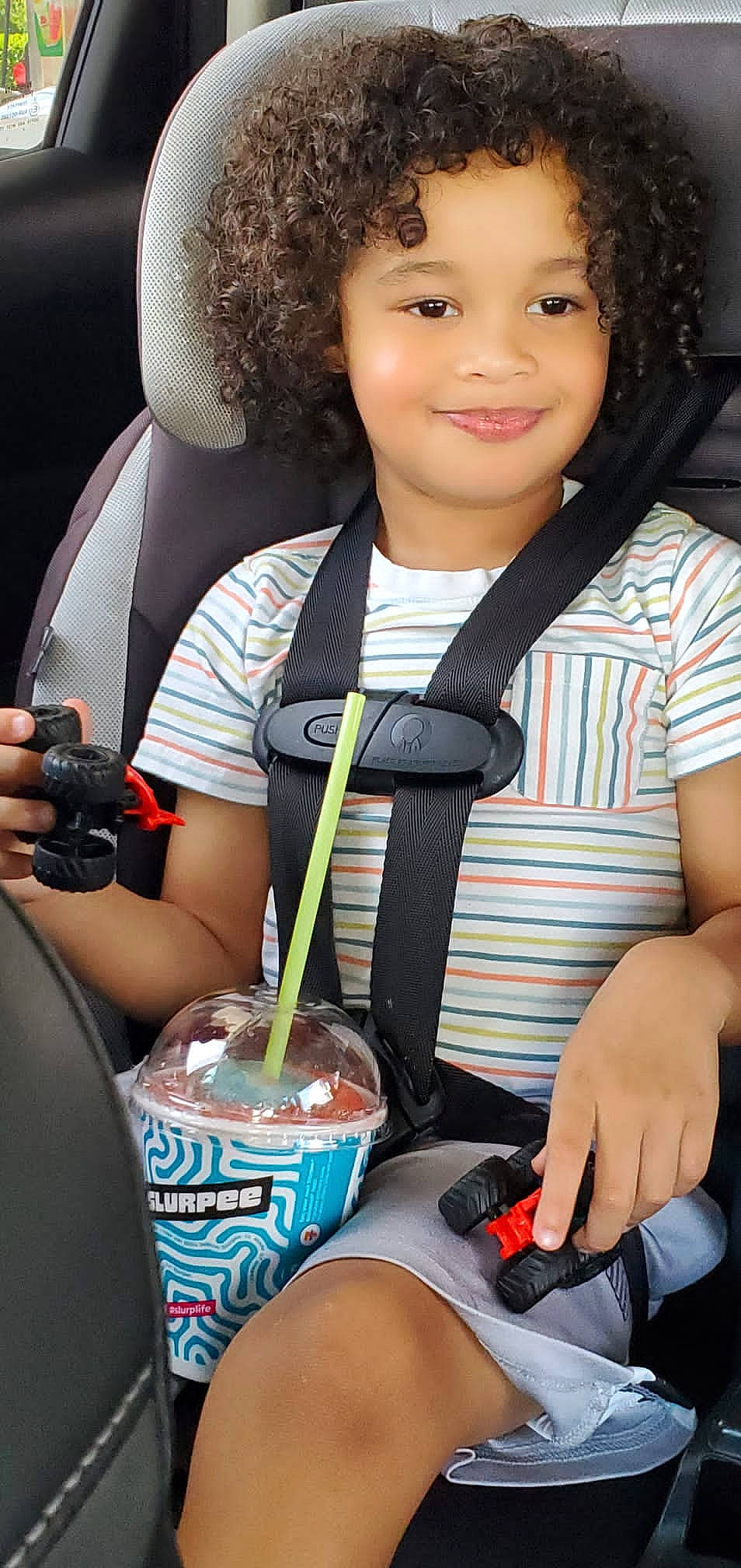 Kannon is registered to the contest to win money with this photo: audio_equipment, beauty, black_hair, child, cool, drink, facial_expression, flash_photography, fun, gadget, glass, hairstyle, happy, human, human_leg, joy, person, recreation, sitting, smile