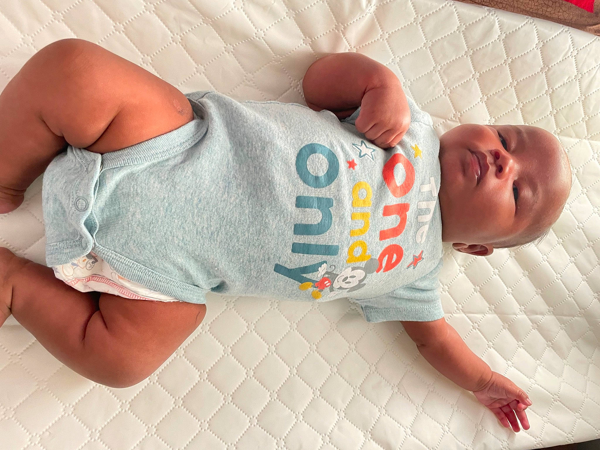 Cai is registered to the contest to win money with this photo: baby, baby_toddler_clothing, comfort, elbow, finger, flooring, foot, gesture, hand, human_body, human_leg, joint, leg, nail, pattern, person, skin, sleeve, thigh, thumb