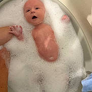 Walker joined the competition — help win amazing prizes! baby, bath, foam, water, bubbles, infant, skin, hand, arm, tub, bathroom, floating, child, young, person, cleaning, support, cute, expression, relaxation
