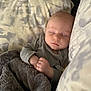 Walker is registered to the contest to win money with this photo: baby, sleeping, blanket, pillow, cozy, infant, peaceful, soft, cute, child, resting, indoors, warm, comfort, naptime, face, head, hand, clothing, portrait