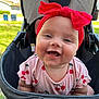 Sophia is registered to the contest to win money with this photo: accessories, architecture, baby, babylaughing, clothing, face, grass, happy, head, jewelry, laughing, necklace, person, photography, plant, portrait, smile, stroller, sunglasses, t_shirt