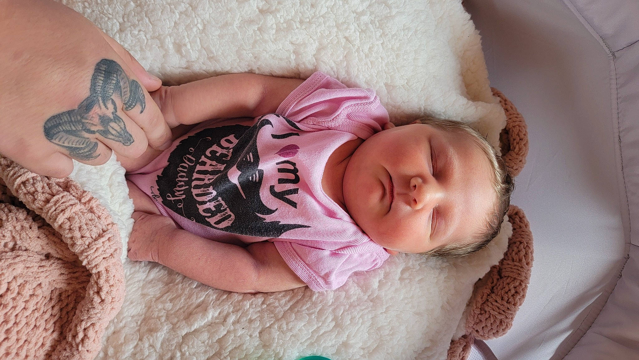 Arizona is registered to the contest to win money with this photo: baby, comfort, elbow, eye, eyelash, finger, hair, hairstyle, happy, hat, head, human_body, joint, lip, mouth, neck, person, skin, sleeve, thigh