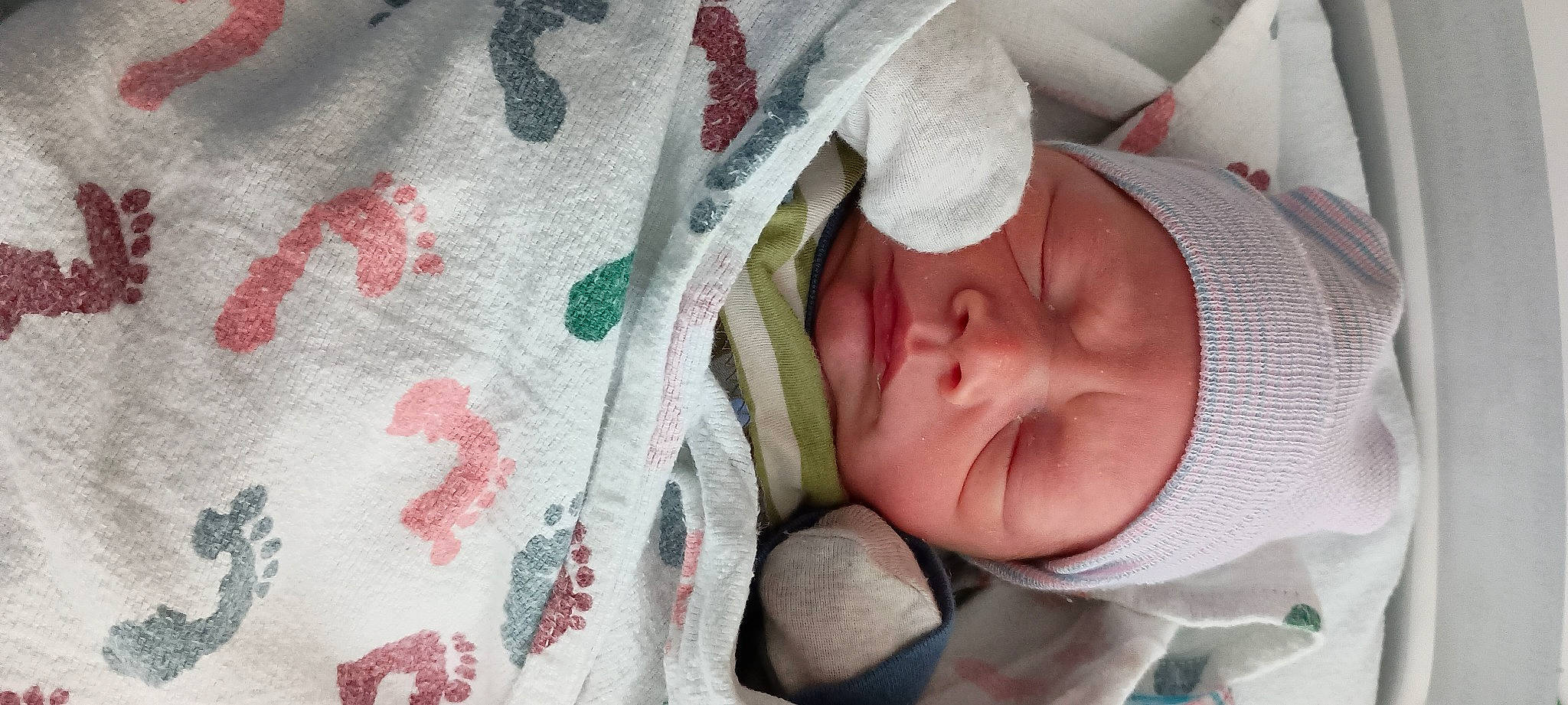 Bret joined the competition — help win amazing prizes! baby, baby_products, beauty, cheek, child, close_up, comfort, face, hand, head, headwear, linens, mammal, nose, person, pink, product, skin, sleeve, textile