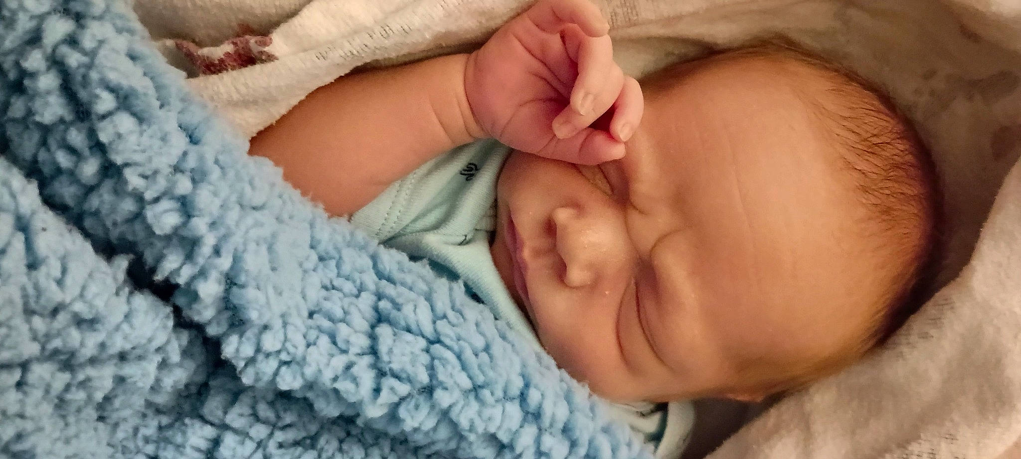 Bret joined the competition — help win amazing prizes! baby, baby_sleeping, baby_toddler_clothing, cheek, child, close_up, comfort, creative_arts, electric_blue, finger, gesture, hand, linens, mammal, nail, pattern, person, skin, textile, thumb