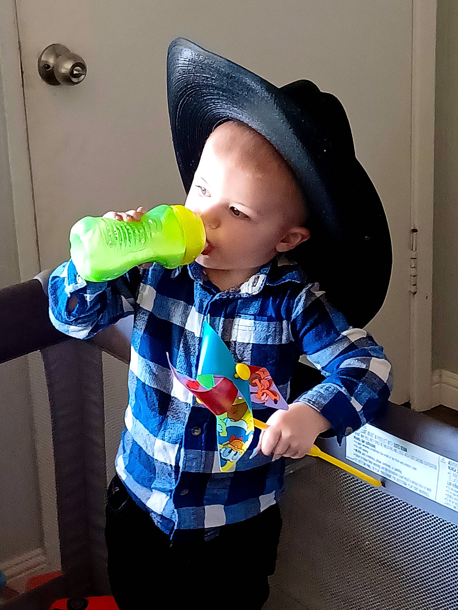 Joshua is registered to the contest to win money with this photo: baby, baby_toddler_clothing, baseball_cap, cap, child, cool, electric_blue, fashion_accessory, finger, fun, hand, outerwear, pattern, person, play, product, sleeve, standing, t_shirt, thumb