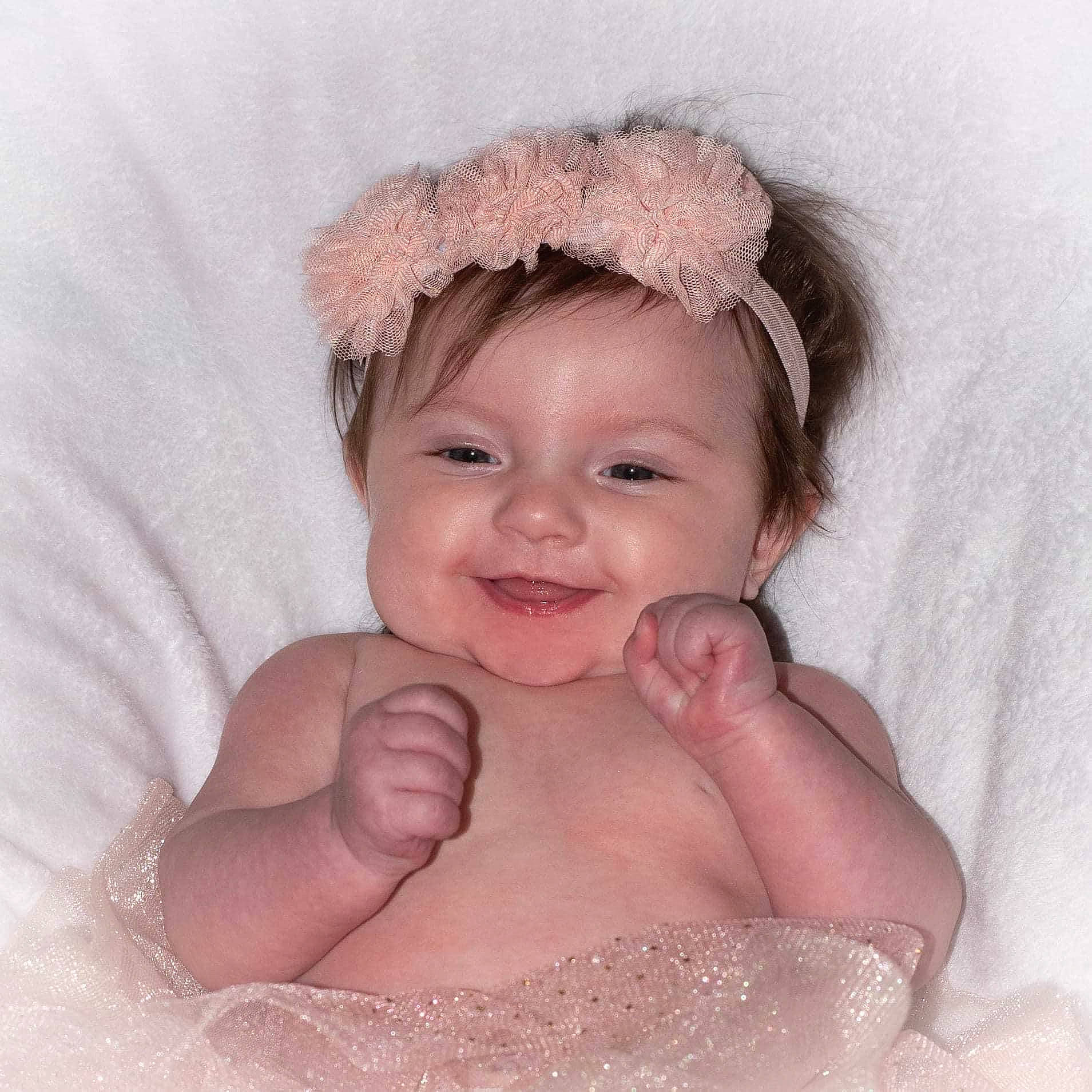 Annalee is registered to the contest to win money with this photo: baby, bathing, cheek, eye, eyebrow, eyelash, face, facial_expression, finger, fluid, fun, happy, head, iris, joy, lip, person, pink, product, skin