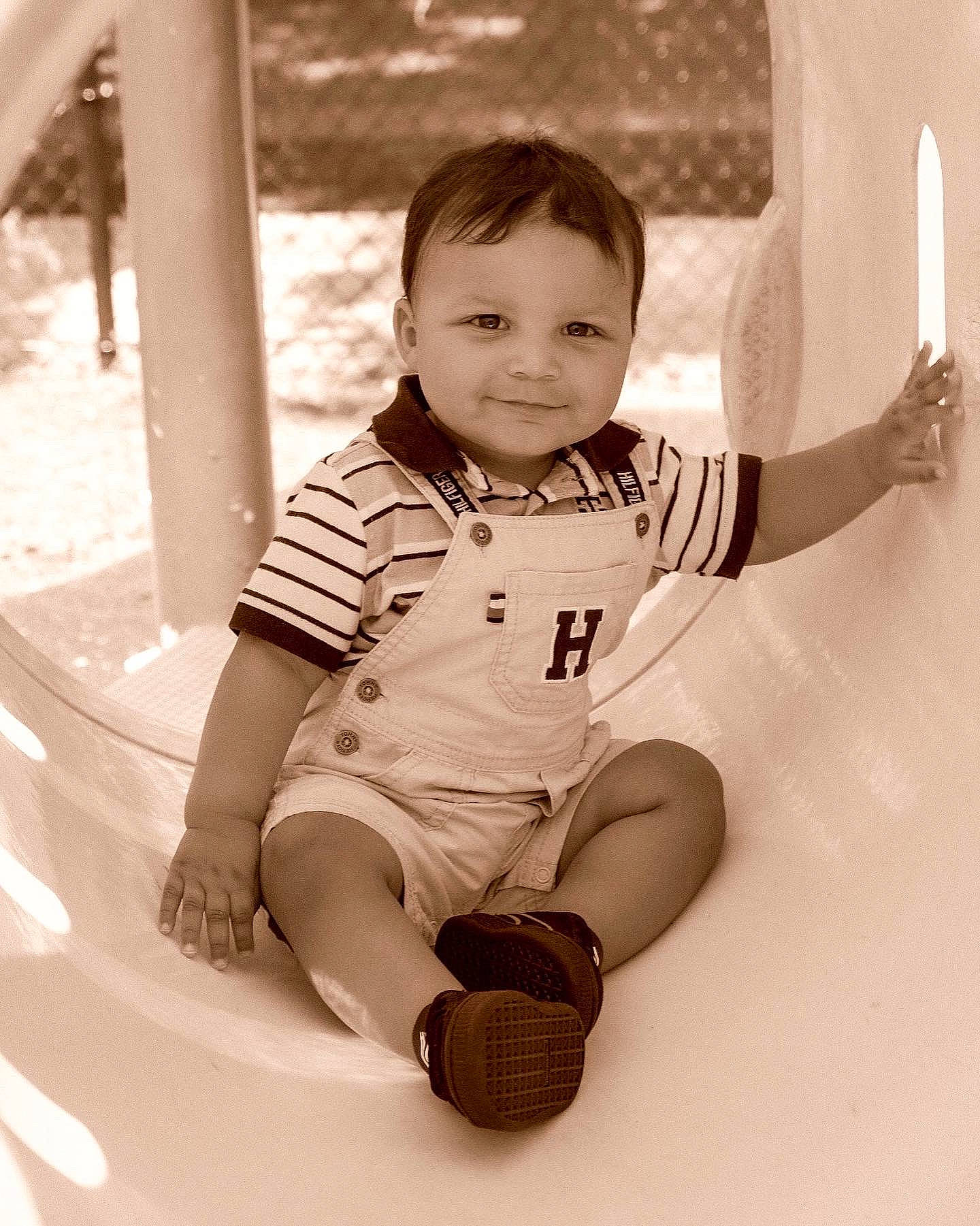 Nash is registered to the contest to win money with this photo: arm, baby_toddler_clothing, black_and_white, flash_photography, fun, gesture, hand, happy, human_body, joint, joy, leg, person, shorts, skin, sleeve, smile, standing, style, t_shirt