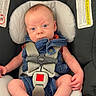 baby, infant, car_seat, denim, blue_eyes, safety_harness, chicco, straps, cute, child, seat, padding, warning_label, clothing, person, newborn, small, looking, restraint, indoor