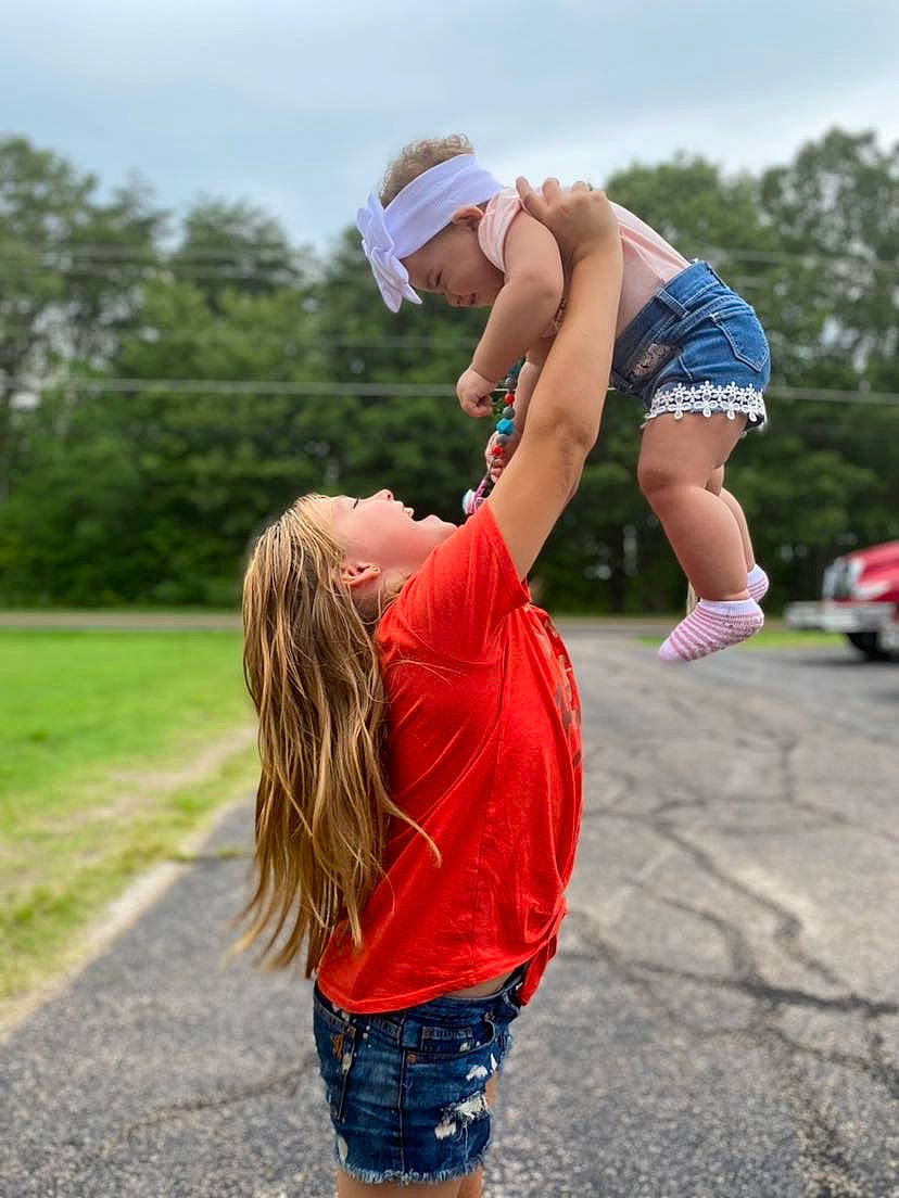 Mariah joined the competition — help win amazing prizes! baseball_cap, child, electric_blue, exercise, fun, grass, happy, hat, headwear, human_leg, knee, leisure, people_in_nature, person, plant, recreation, shorts, sky, sportswear, t_shirt