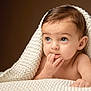 Elizabeth is registered to the contest to win money with this photo: baby, infant, child, face, eyes, hand, fingers, blanket, knit, cozy, portrait, cute, skin, expression, curious, indoors, soft, warm, head, lying