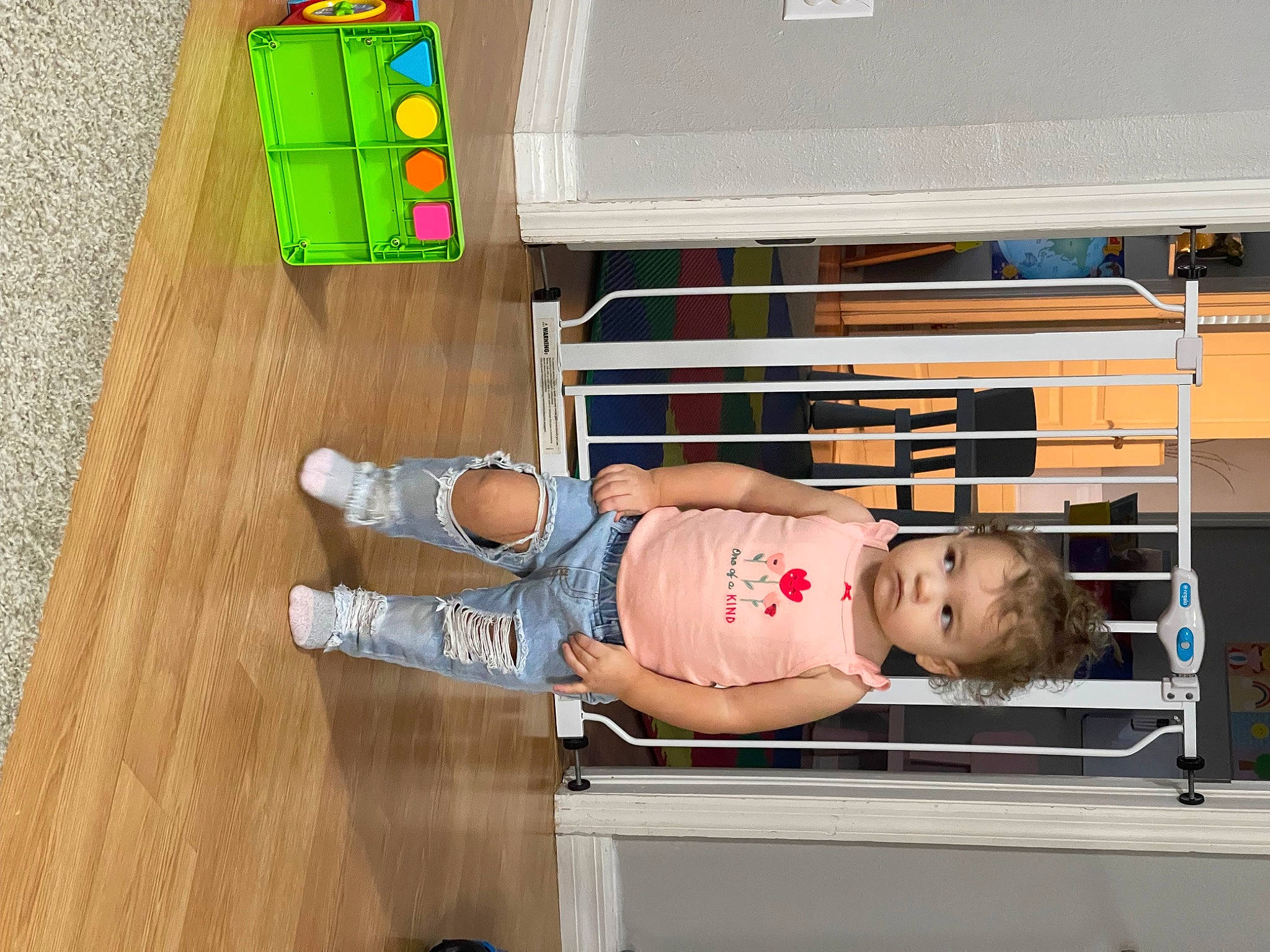 Zoe joined the competition — help win amazing prizes! baby, baby_toddler_clothing, box, cabinetry, cardboard, child, comfort, flooring, hardwood, office_supplies, person, plastic, room, shelving, shipping_box, smile, t_shirt, toddler, varnish, wood