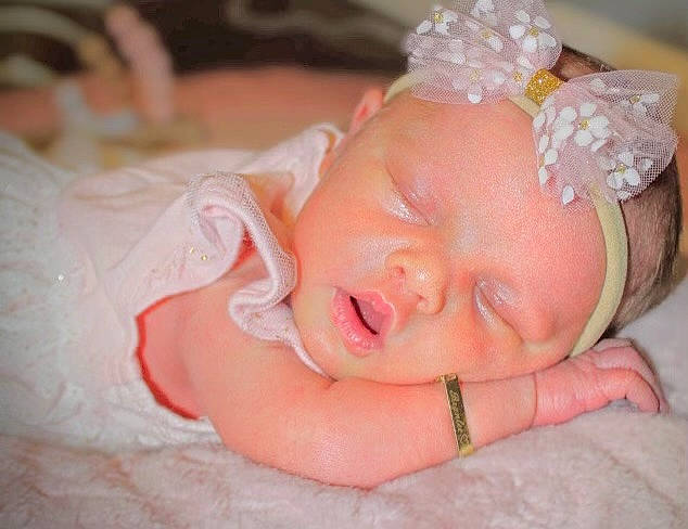 Brynlee joined the competition — help win amazing prizes! arm, baby, baby_toddler_clothing, comfort, dress, eye, eyebrow, eyelash, face, hand, happy, head, headpiece, headwear, human_body, lip, mouth, nail, person, pink