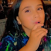 May Lynn a rejoint le concours — aidez-le/la à gagner de superbes lots ! child, drink, straw, colorful_shirt, long_hair, indoor, restaurant, candid, face, person, table, glass, people, casual, dining, young, sitting, hair, blur, night