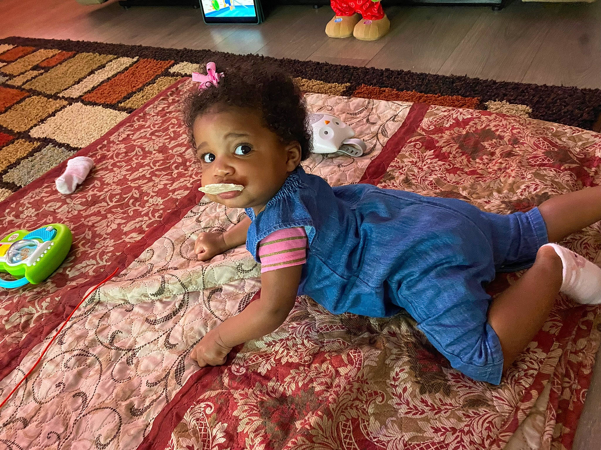 Arianna is registered to the contest to win money with this photo: adaptation, baby_toddler_clothing, child, cool, finger, floor, flooring, fun, grass, hairstyle, happy, leisure, person, pink, skin, smile, textile, thigh, tints_and_shades, toddler