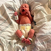 Julian joined the competition — help win amazing prizes! newborn, baby, infant, hospital, blanket, diaper, yawning, wrists, ankles, id_bands, bed, sleeping, skin, cute, small, lying_down, hospital_room, soft, comfort, resting
