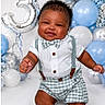 baby, smiling, child, bow_tie, suspenders, checkered_clothing, balloons, silver_balloon, number_3, celebration, birthday, blue_balloon, white_balloon, festive, happy, cute, portrait, studio, posing, infant