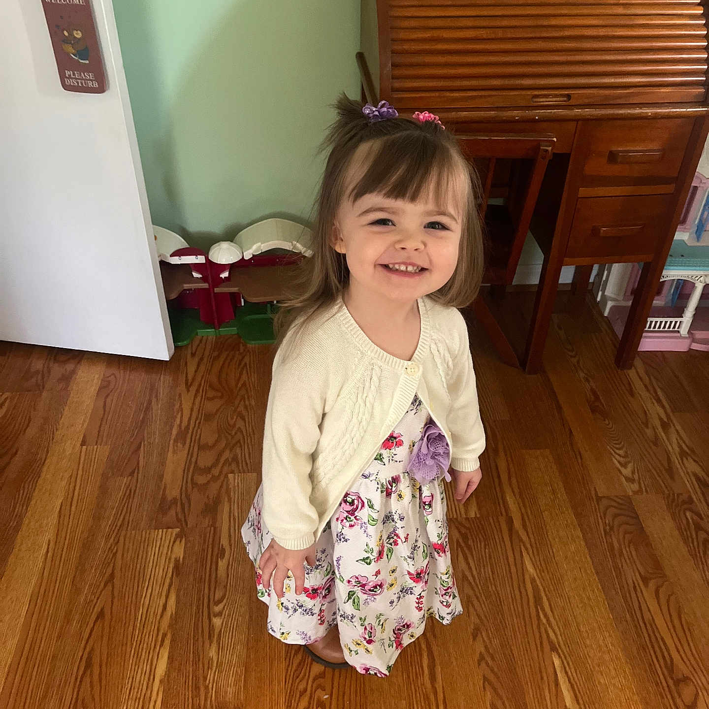 Grace is registered to the contest to win money with this photo: cabinet, child, clothing, dress, face, female, furniture, girl, happy, hardwood, head, indoors, interiordesign, person, photography, plywood, portrait, smile, stainedwood, wood