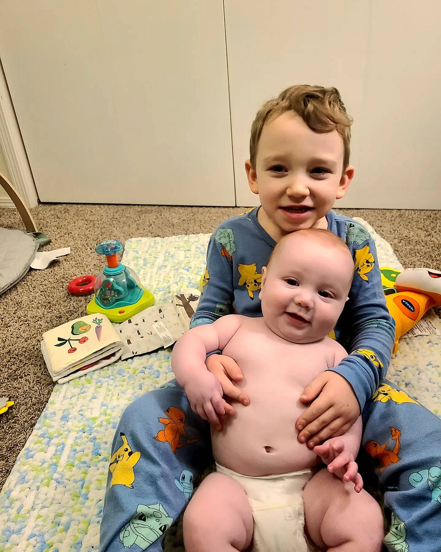 Arthur is registered to the contest to win money with this photo: abdomen, baby, baby_toddler_clothing, barechested, cheek, chest, child, eye, finger, flooring, foot, fun, happy, iris, joy, person, skin, smile, thigh, thumb