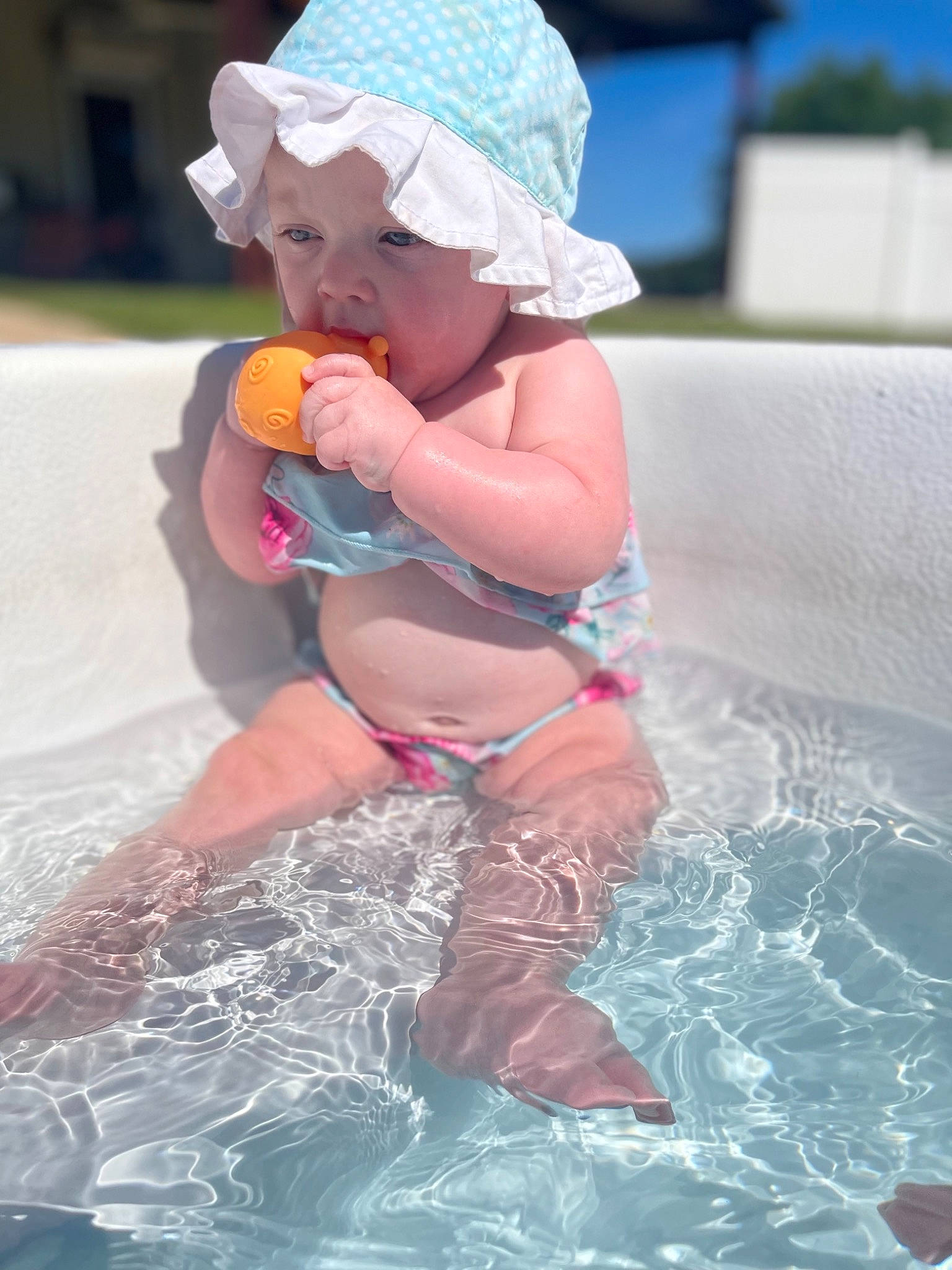 Raelynn joined the competition — help win amazing prizes! baby, baseball_cap, bathing, cap, child, fun, happy, hat, headgear, headwear, leisure, person, personal_protective_equipment, pink, recreation, summer, sun_hat, swimming_pool, swimwear, toddler