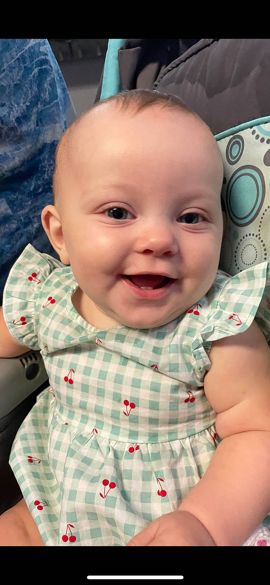 Raelynn is registered to the contest to win money with this photo: baby, baby_toddler_clothing, blue, cheek, chin, face, facial_expression, head, human, iris, joy, lip, mouth, nose, organ, person, product, skin, sleeve, smile