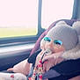 Layana a rejoint le concours — aidez-le/la à gagner de superbes lots ! child, toddler, baby, car_seat, pacifier, beaded_toy, sunglasses_filter, winter_coat, hood, heart_print_leggings, seatbelt, car_window, car_interior, blurred, pastel_colors, portrait, sleepy, accessory, travel, soft_lighting