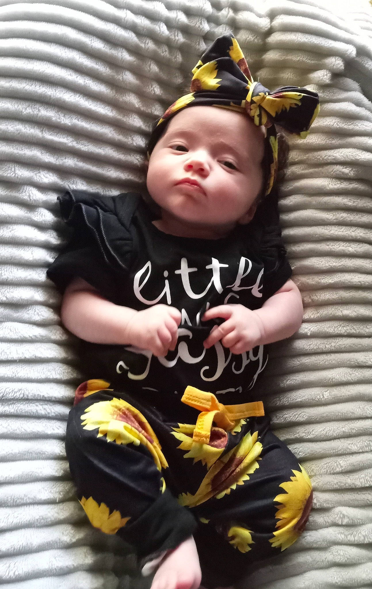 Annabelle joined the competition — help win amazing prizes! baby, baby_toddler_clothing, child, cool, costume, eye, finger, fun, hand, happy, hat, person, personal_protective_equipment, sitting, sleeve, sock, sports_equipment, t_shirt, thigh, toddler