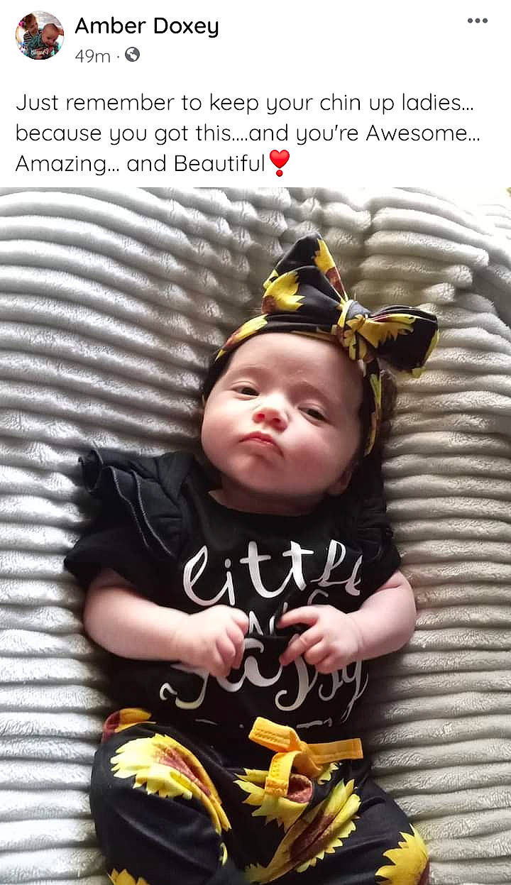 Annabelle is registered to the contest to win money with this photo: baby, baby_products, baby_toddler_clothing, beanie, child, flash_photography, font, fun, grass, happy, hat, logo, pattern, person, photo_caption, photography, product, sitting, sleeve, t_shirt