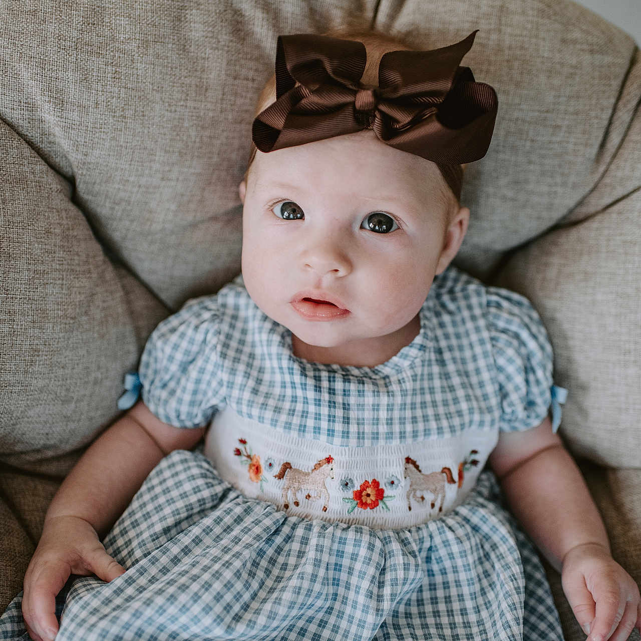 Eleanor joined the competition — help win amazing prizes! armchair, baby, bodypart, chair, clothing, couch, cushion, face, finger, furniture, hand, happy, hat, head, homedecor, person, photography, portrait, sitting, smile