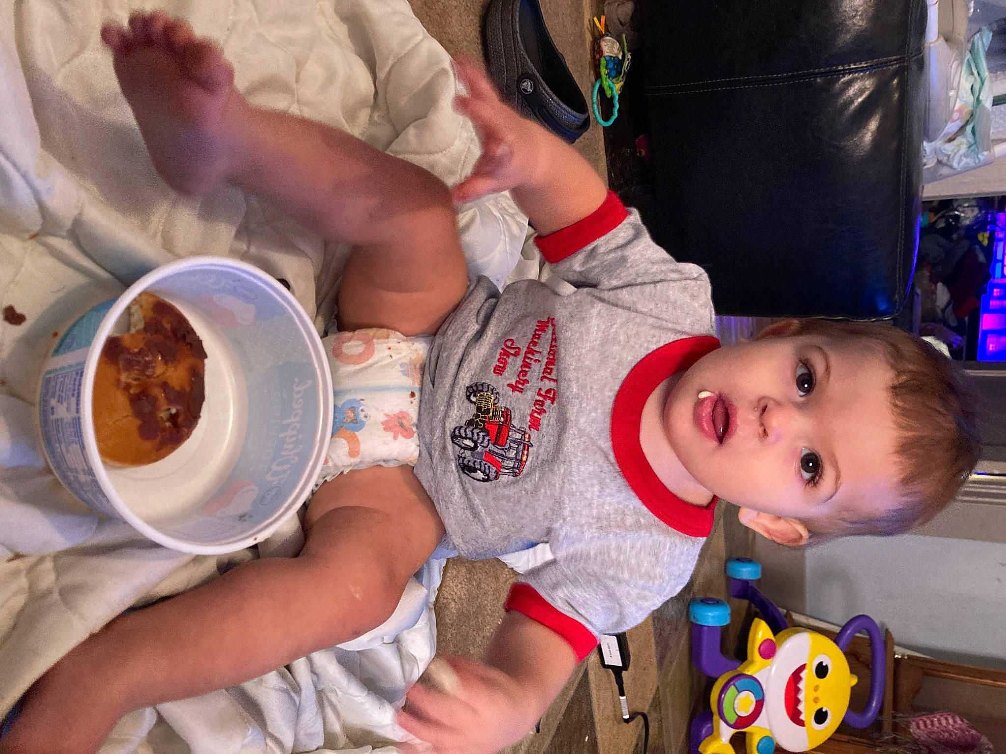 Aryiah is registered to the contest to win money with this photo: baby, baby_toddler_clothing, child, comfort_food, cuisine, culinary_art, event, food, hat, ingredient, person, plate, recipe, surprise, t_shirt, tableware, toddler, toy