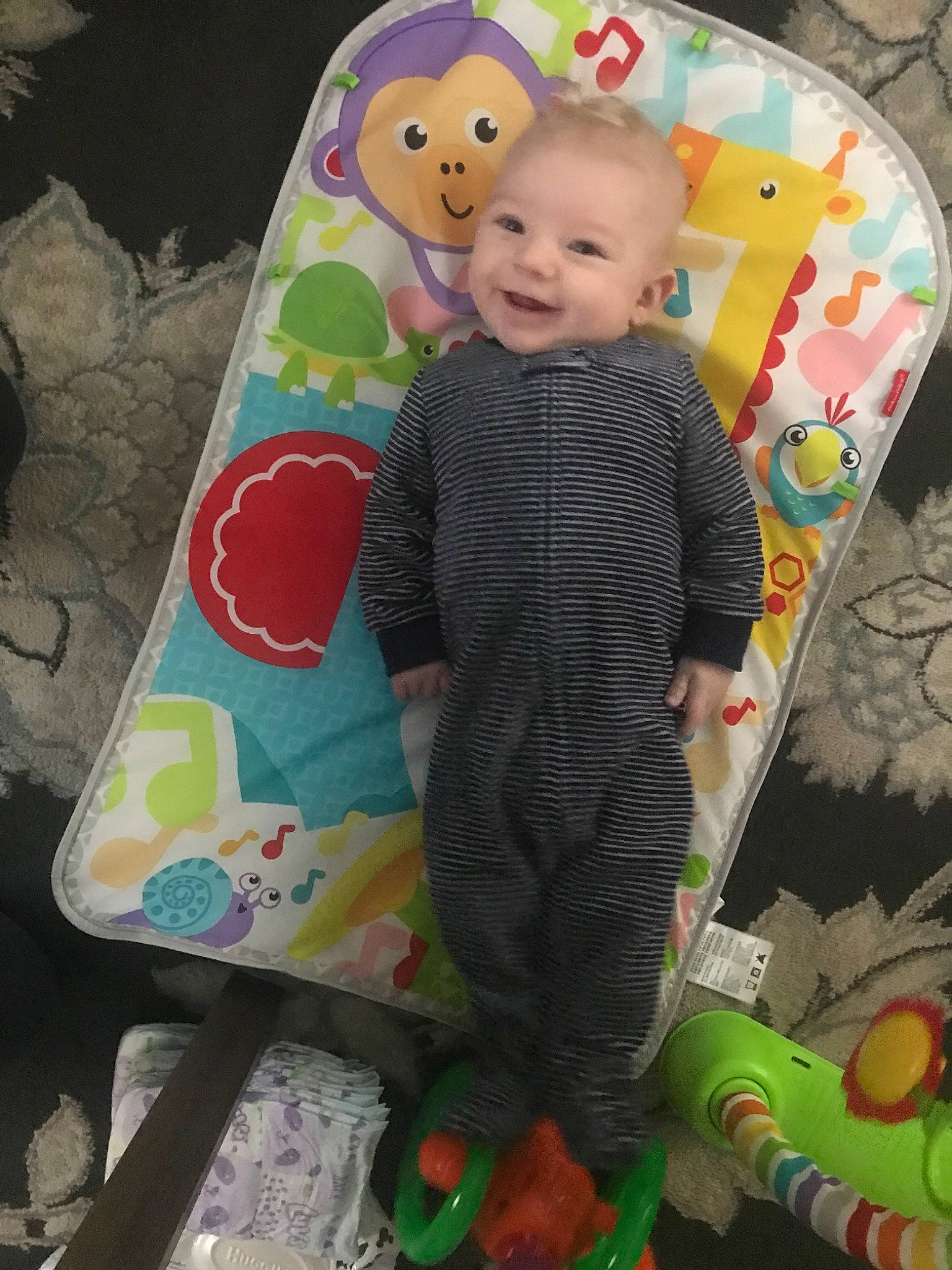 Nolan is registered to the contest to win money with this photo: baby, baby_products, baby_toddler_clothing, baby_toys, child, person, play, product, smile, textile, toddler, toy